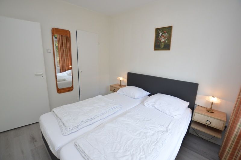 Bright bedroom in Apartment Kerckeland 20, De Koog, Texel with comfortable double bed.