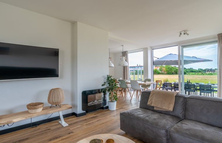 Modern living room in Cottage in De Koog overlooking terrace, Texel, Wadden Islands.