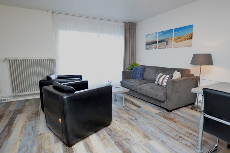 Bright living room in Motel Texel - Apartment 211/1P, De Koog, Texel, with stylish furnishings.