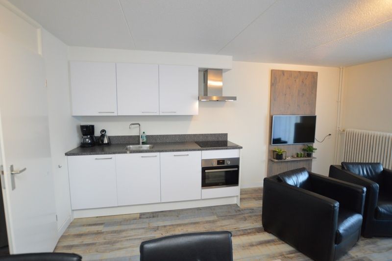 Fully equipped kitchen in Motel Texel - Apartment 211/1P, De Koog, Texel, with modern appliances.