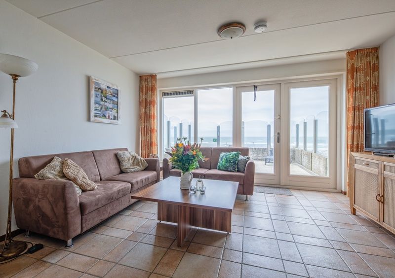 Cozy living room in Resort De Buteriggel Apartment 1 with sea view in De Koog, Texel.