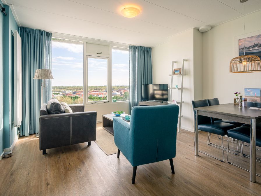 Gezellige woonkamer in Appartement Juliana 176 Eilandzicht, De Koog, Texel met uitzicht op de Waddeneilanden.