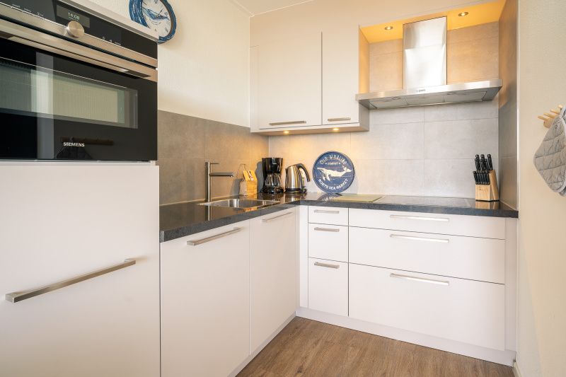Volledig uitgeruste keuken in Appartement Juliana 176 Eilandzicht, De Koog, Texel, voor een comfortabel verblijf op de Waddeneilanden.
