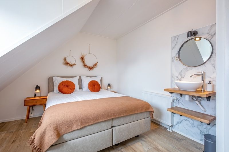 Cozy bedroom in Windlust vacation home, De Koog, Texel with modern furnishings