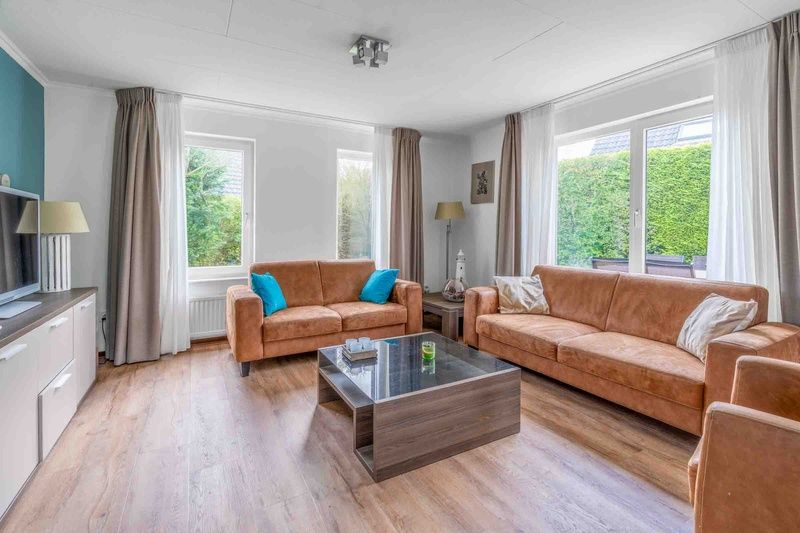 Comfortable seating area in Holiday home Honeysuckle 49, De Koog, Texel, with modern furniture.