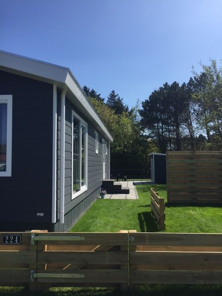 Sunny terrace at Chalet Bregkoog 224, De Koog, Texel, perfect for outdoor relaxation.