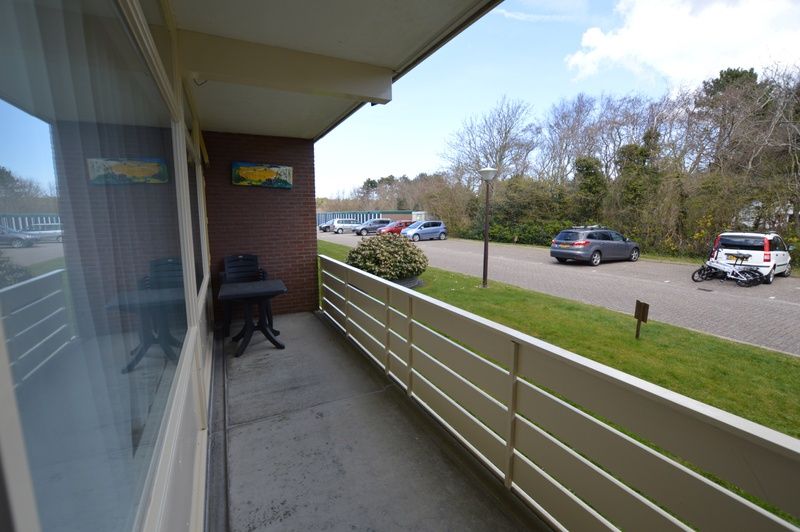 Balcony with view in Apartment Kerckeland 70, vacation home in De Koog, Texel.