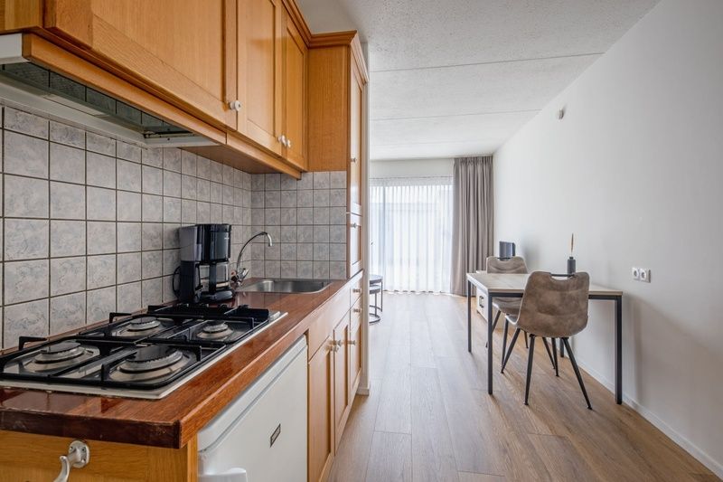 Modern kitchen in Two persons apartment large - first floor, De Koog, Texel with all necessary amenities.