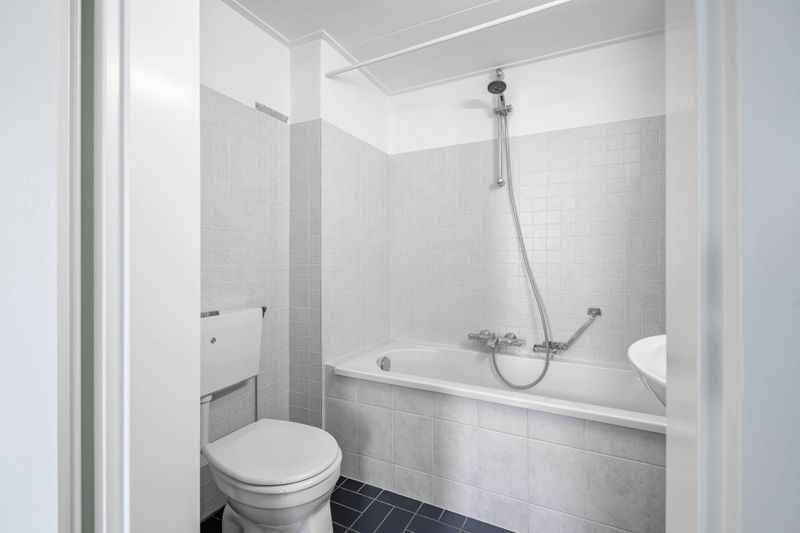 Stylish bathroom with bath in Two persons apartment large - first floor, De Koog, Texel, Wadden Islands.