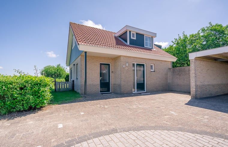 Vorderansicht des Ferienhauses in De Koog, Texel Ferienhaus mit Parkplatz, Watteninseln.