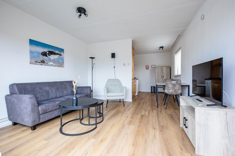 Geraeumige Sitzecke in Zwei Personen Wohnung gross - erster Stock, De Koog, Texel, ideal fuer Entspannung auf den Watteninseln.