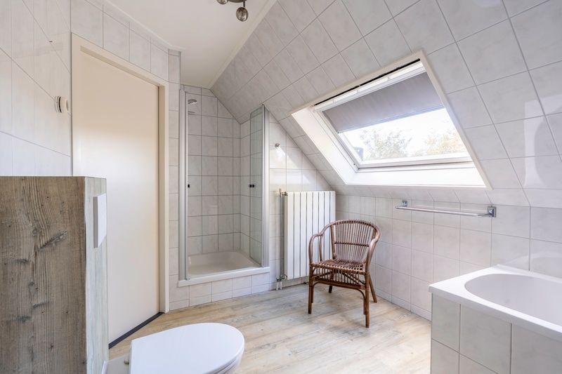Stylish bathroom with shower in Holiday home Kamperfoelie 57, De Koog, Texel offers modern comforts.