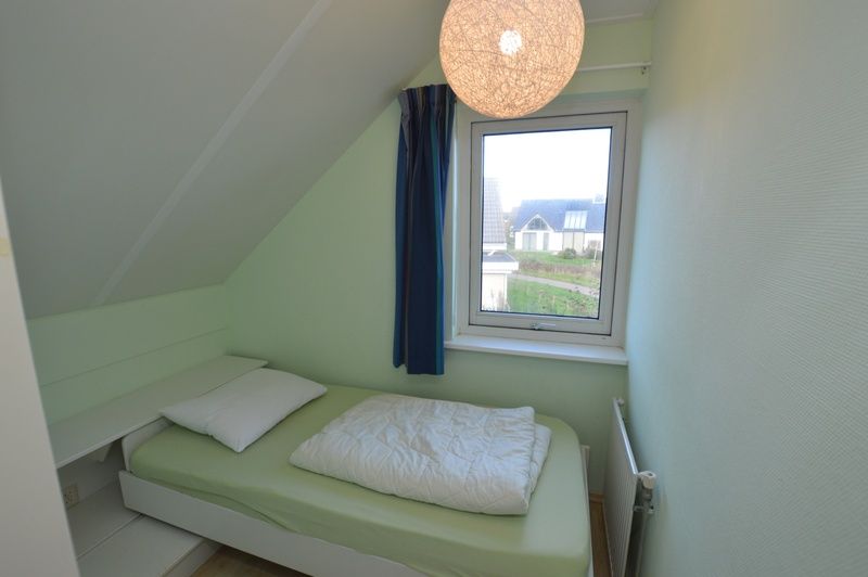 Cozy single room in Holiday home Stappeland 199, De Koog, Texel, with a view of the surroundings.