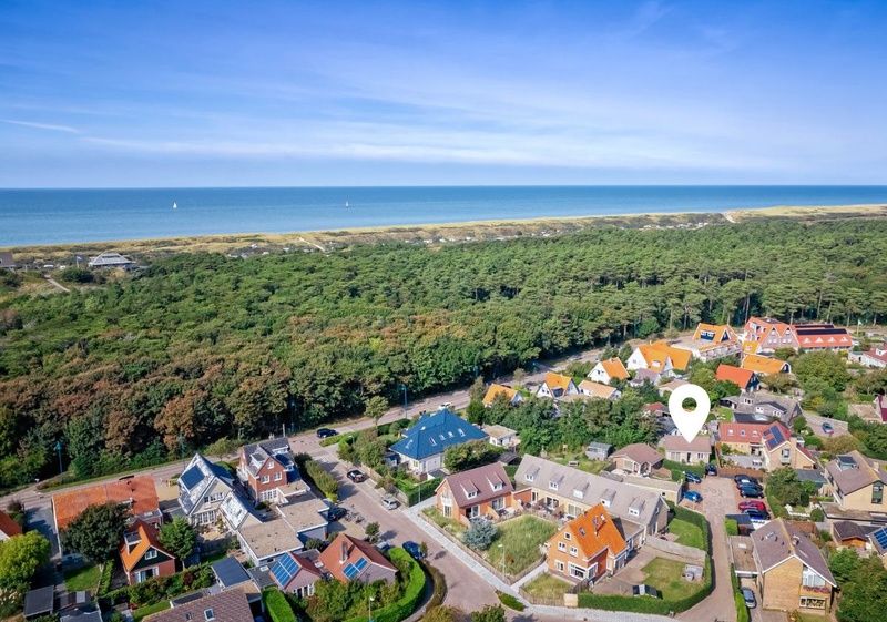 Aerial view of De Koog, Texel with The Strandvondst vacation home near the shore.