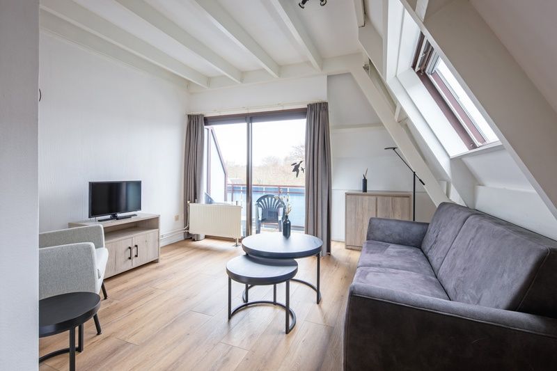 Cozy sitting area in Two persons apartment large - second floor, De Koog, Texel with modern furnishings.