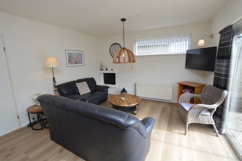 Stylish interior of Holiday home Stappeland 205 in De Koog, Texel with modern furniture and lots of natural light.