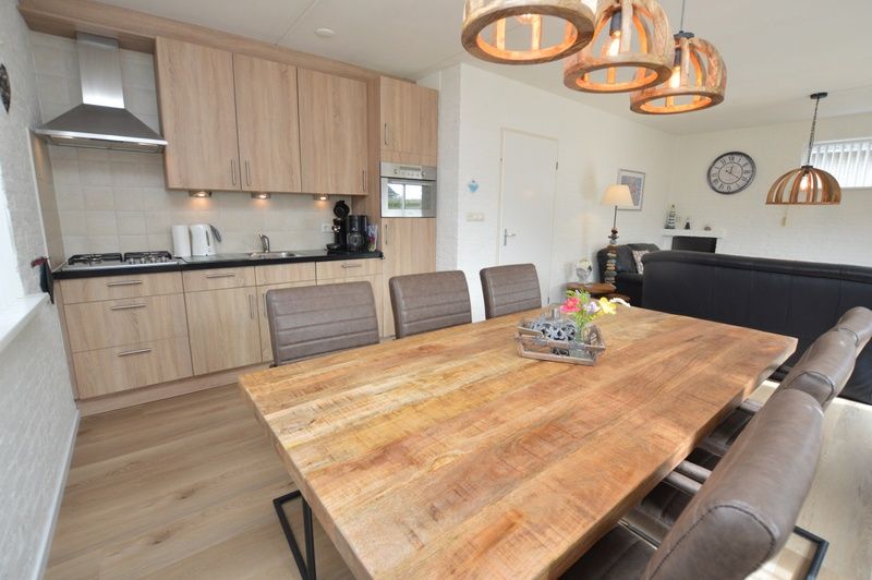 Vacation home Stappeland 205 in De Koog, Texel features a fully equipped kitchen and a spacious dining room.
