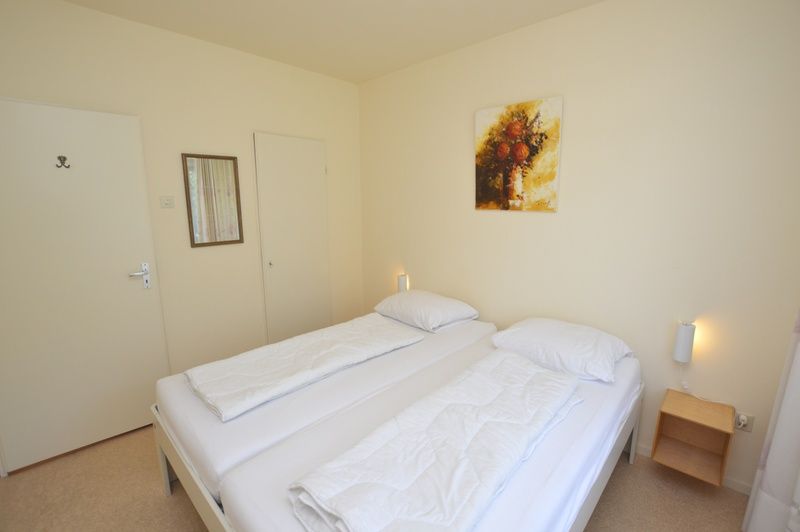 Ruhiges Schlafzimmer im Appartement Kerckeland 64, De Koog, Texel, ideal fuer einen erholsamen Schlaf.