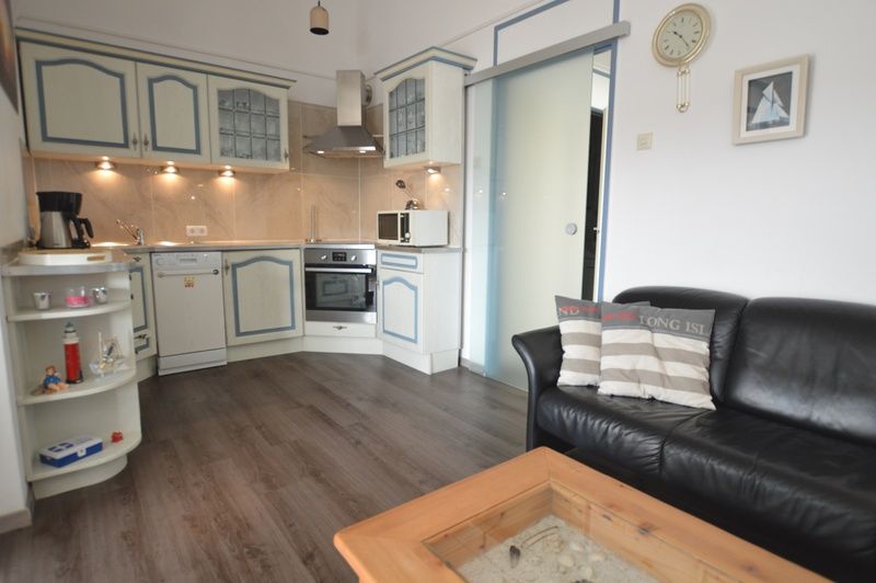 Fully equipped kitchen in Motel Texel - Apartment 315/1T, De Koog, Texel with modern appliances and plenty of storage space.