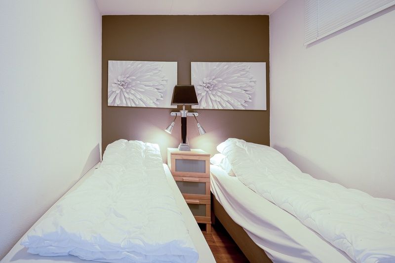 Second bedroom in Apartment Juliana 042, De Koog, Texel, offers cozy sleeping accommodation on the Wadden Islands.