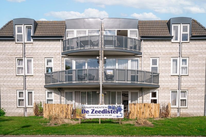 Exterior of Apartment Zeedistel 24, De Koog, Texel with balcony.