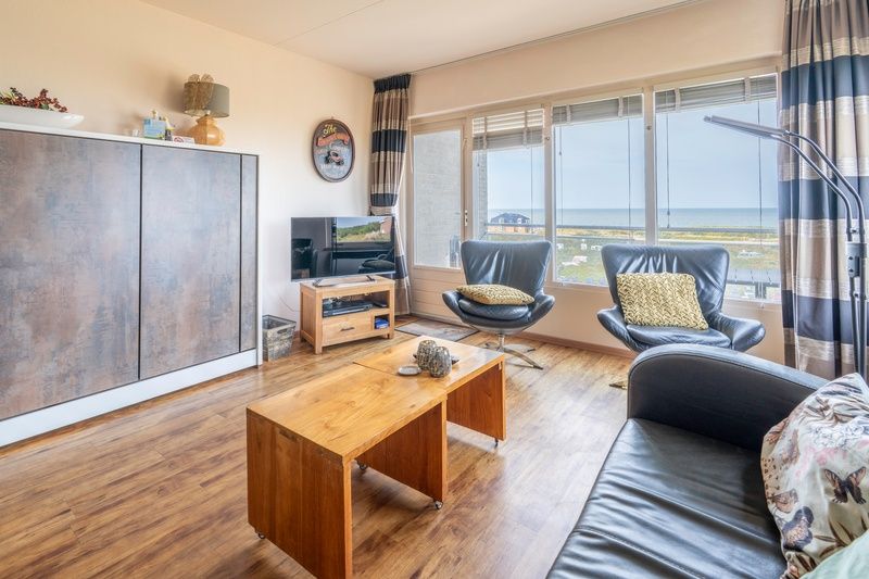 Cozy sitting area in Apartment Juliana 168 Zeezicht, De Koog Texel, overlooking the coastline.