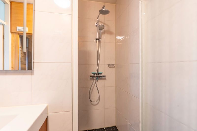 Walk-in shower in Apartment Juliana 168 Zeezicht, De Koog Texel, for a luxury shower experience.