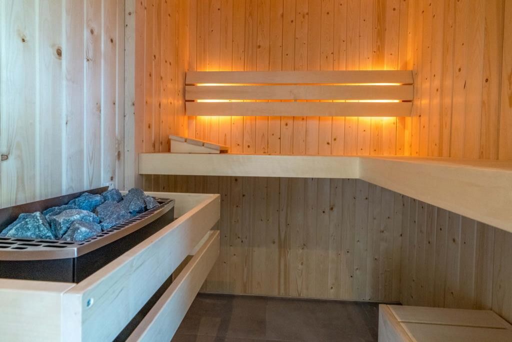 Holzsauna in Tapuit 10a, Ferienhaus in De Koog, Texel fuer ultimative Entspannung.