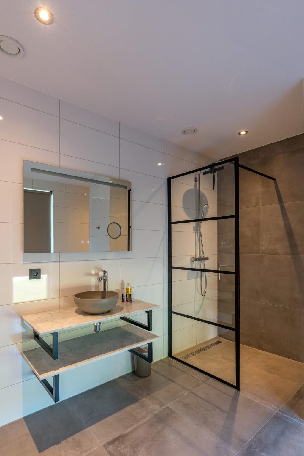 Stylish bathroom in Kluut 16a vacation home in De Koog, Texel.