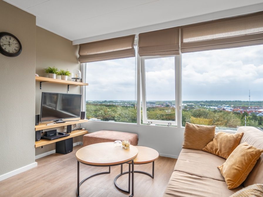 Cozy living room with panoramic views in Apartment Juliana 178 Eilandzicht, De Koog, Texel.