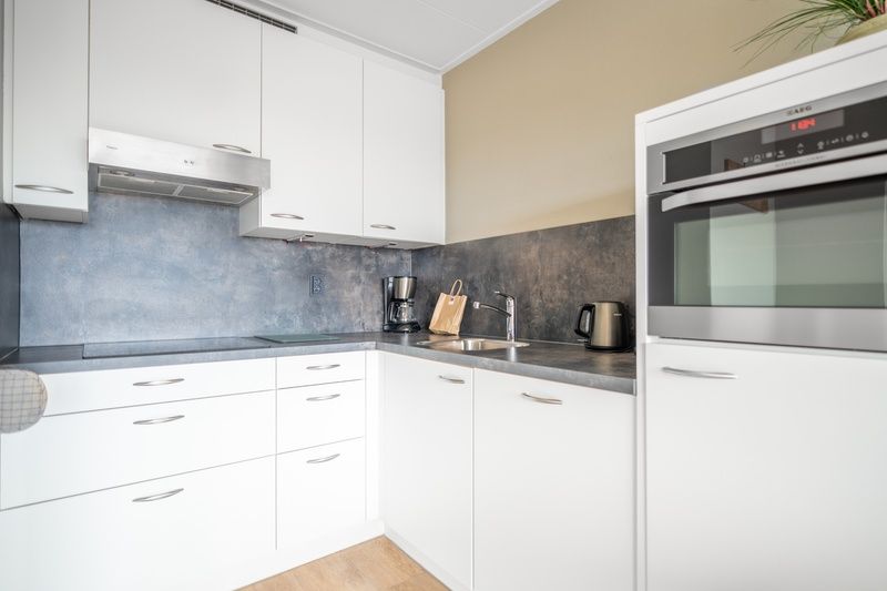 Modern kitchen with built-in appliances in Apartment Juliana 178 Eilandzicht, De Koog, Texel.