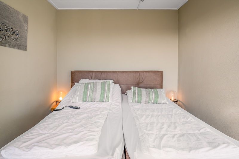 Cozy bedroom with mood lighting in Apartment Juliana 178 Eilandzicht, De Koog, Texel.