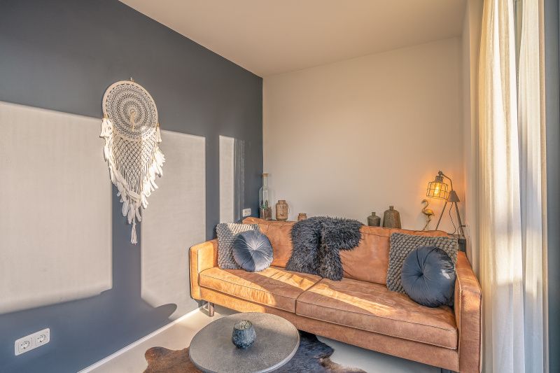 Stylish sitting area in Het Bospad - Brink 15, De Koog, Texel. Ideal for a relaxing stay on the Wadden Islands.