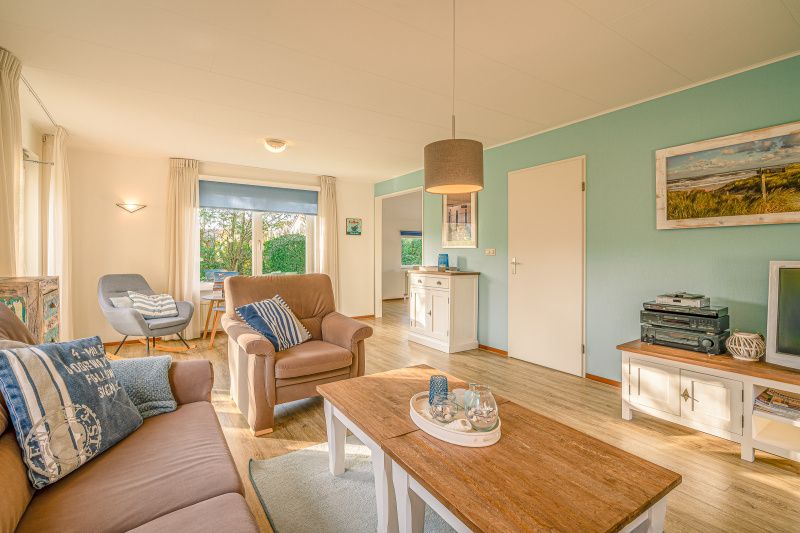 Spacious living space in Holiday home Honeysuckle 65, De Koog, Texel, with lots of natural light.