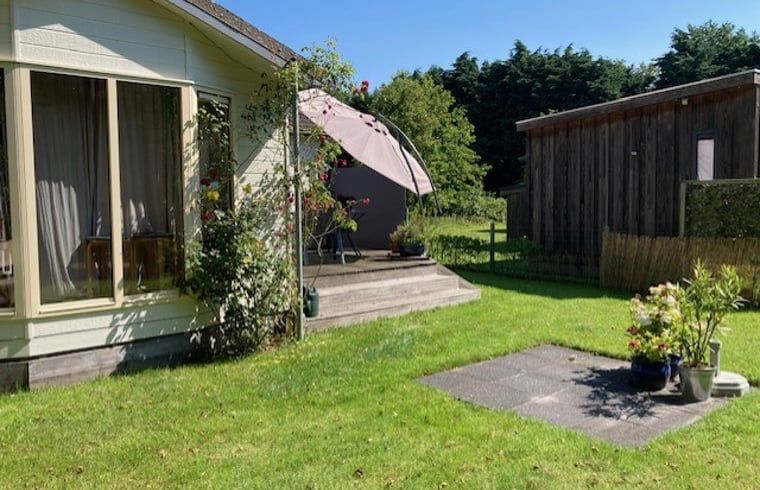 Green garden at Holiday home in De Koog with sunny terrace, Texel, Wadden Islands.