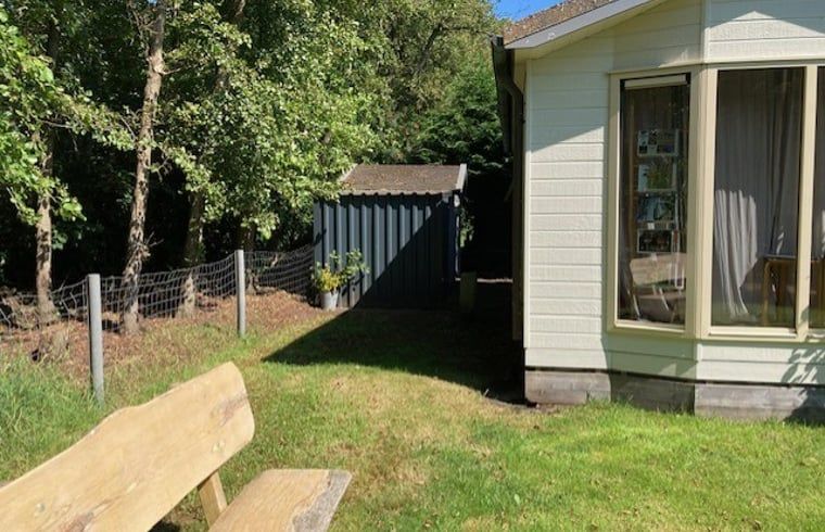 Shady corner of the garden at Holiday home in De Koog, Texel, Wadden Islands.
