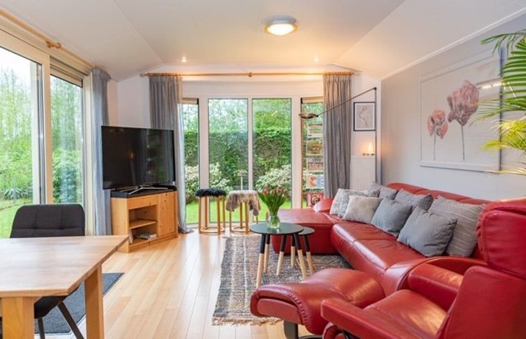 Bright living room of Holiday home in De Koog with comfortable seating area, Texel, Wadden Islands.
