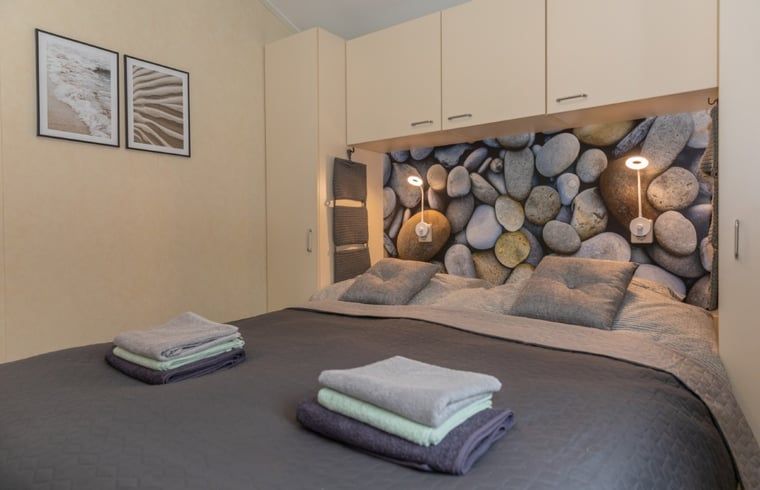Bedroom with restful decor in Holiday home in De Koog, Texel, Wadden Islands.