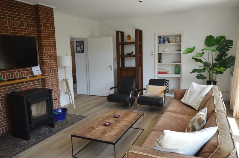 Cozy fireplace and stylish decor in Plevierstraat 24 - Tuunwoal vacation home, De Koog, Texel.