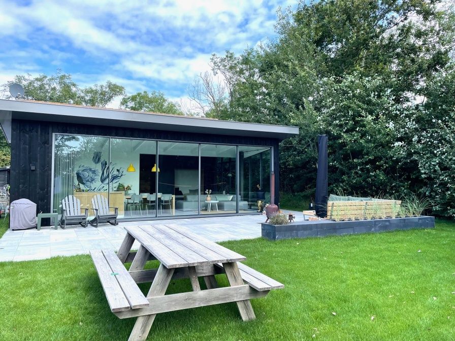 De Koerie vacation home in De Koog Texel with spacious garden and terrace, ideal for relaxation on the Wadden Islands.