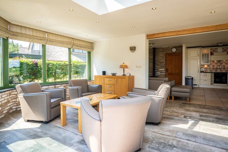 Heller Wintergarten in Villa mit Wintergarten, De Koog, Texel, bietet Aussicht auf die Natur der Watteninseln.