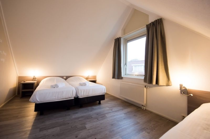 Geraeumiges Doppelzimmer in Villa 2, De Koog Texel, ideal fuer einen entspannten Urlaub.
