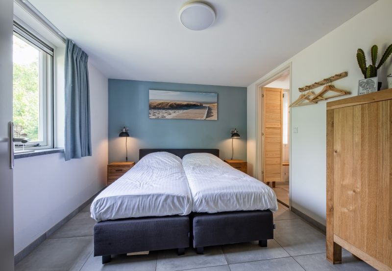 Comfortable bedroom in Holiday Park Het Oude Dijkje - Vuurcoogh, De Koog, Texel with peaceful views.