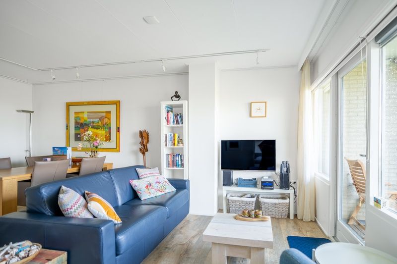 Stylish living room of Apartment Juliana 112 Zeezicht in De Koog, Texel with comfortable furniture.