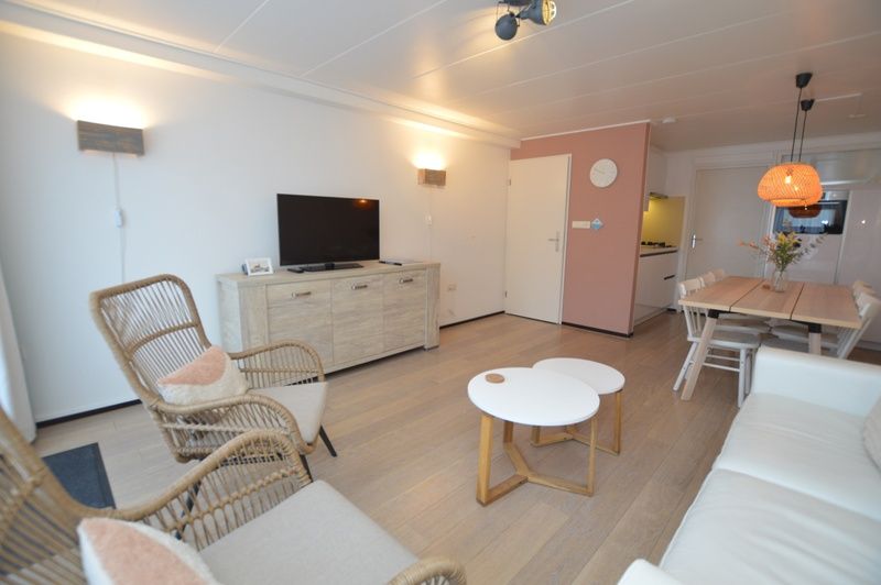 Bright and spacious living space in Apartments Anna - Sun, De Koog, Texel, with modern amenities and a cozy atmosphere.