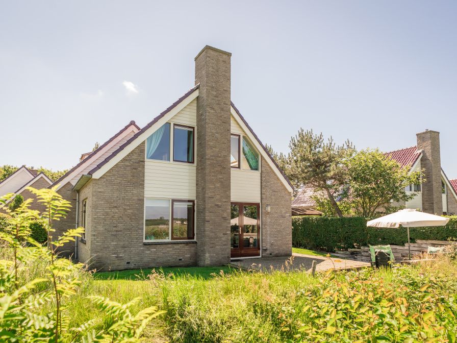 Villa 6 persons in De Koog, Texel offers a charming vacation home with a sunny terrace and green surroundings on the Wadden Islands.