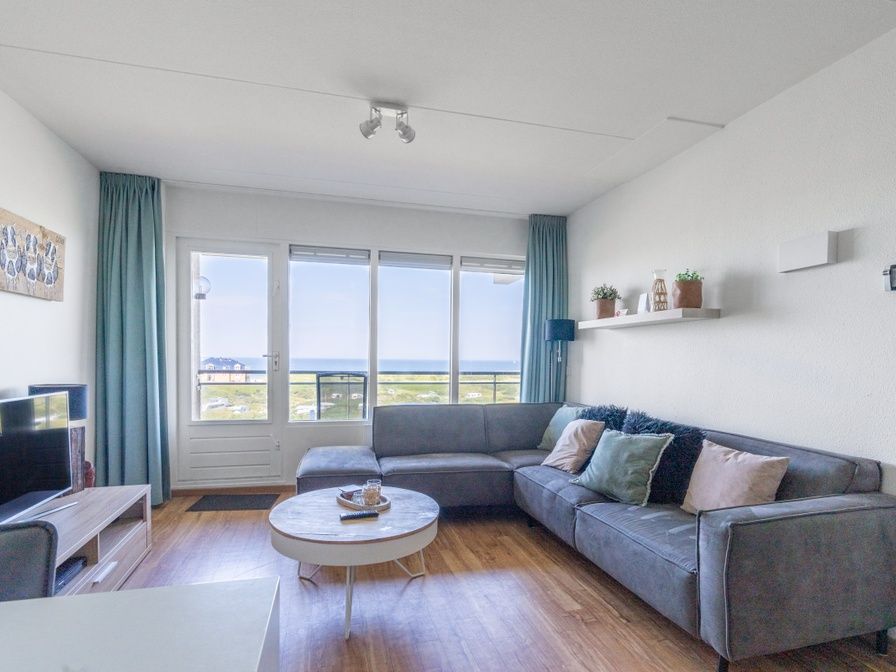 Wohnung Juliana 102 Zeezicht in De Koog, Texel mit Panoramablick vom Wohnzimmer auf die Watteninseln.