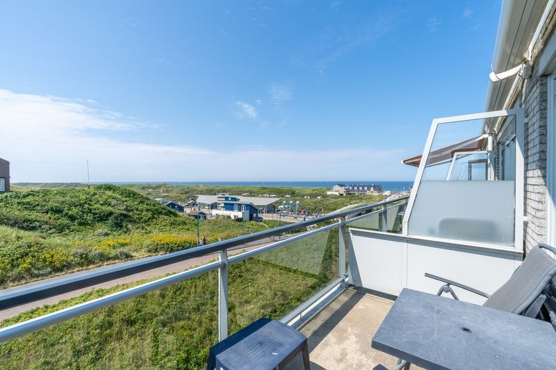 Balcony with sea view in Apartment Juliana 094 Island and Sea View, De Koog, Texel overlooking the dunes.