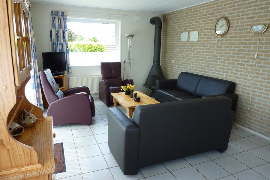 Gemtliches Wohnzimmer in Stappeland 201, De Koog, Texel mit komfortabler Sitzecke.
