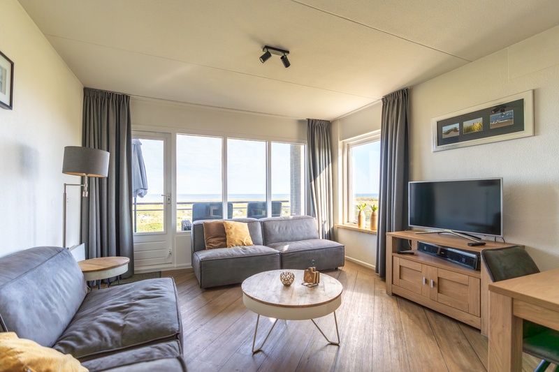 Spacious sitting area with sea view at Apartment Juliana 118 Zeezicht, De Koog, Texel.